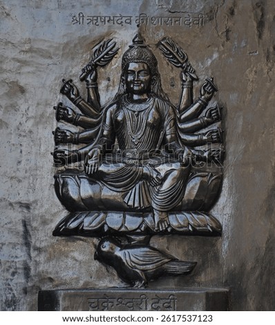 Carved structure of goddess Chakreshwari Devi at the Mangi-tungi jain temple