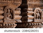 Carved wood wall decoration in Patan Durbar Square royal medieval palace and UNESCO World Heritage Site. Lalitpur, Nepal.