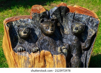 Carving And Burning On Wood. Unusual Hobby. Carved Bears As A Symbol Of Good Nature And Strength.