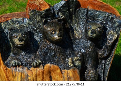 Carving And Burning On Wood. Unusual Hobby. Carved Bears As A Symbol Of Good Nature And Strength.