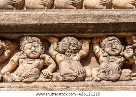 Carving of dwarf-like Yakshas at the Kelaniya temple in Sri Lanka.
