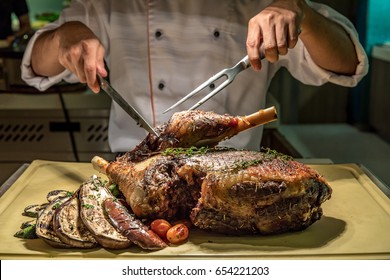 Carving Of Roasted Lamb Meat