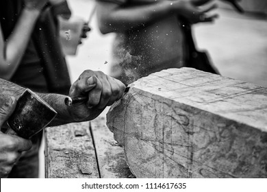 Carving stone, craftsman shaping stone, art and crafts