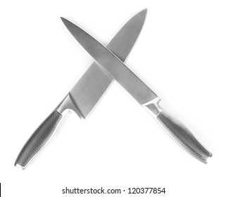 Carving and utility knives crossed, isolated on white