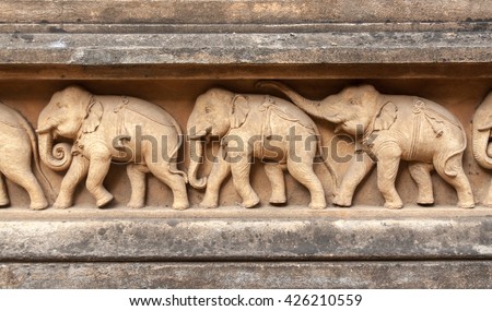 Carvings of elephants around the walls of the Kelaniya Temple, Sri Lanka.