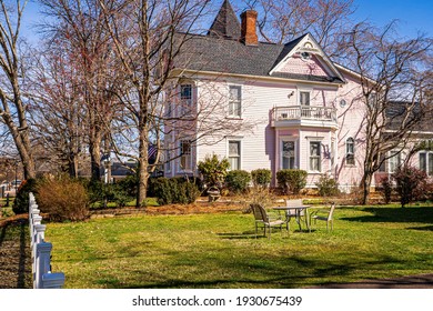 Cary, North Carolina USA-03 06 2021: The Pink House In Downtown Cary From The Lawn.