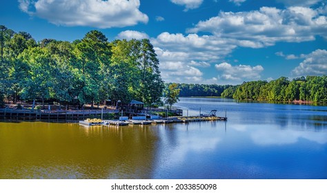 Cary, North Carolina USA-08 30 2021: Bond Park Lake Boat Dock On A Summer Morning