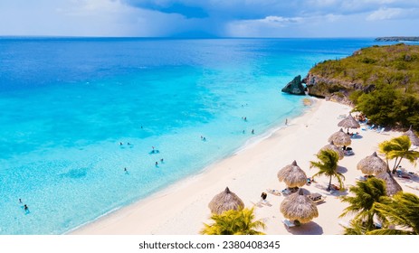 Cas Abao Beach Playa Cas Abao Caribbean island of Curacao, Playa Cas Abao in Curacao Caribbean tropical white beach with a blue turqouse colored ocean. Drone aerial view at the beach on a sunny day