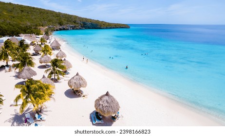 Cas Abao Beach Playa Cas Abao Curacao Caribbean island of Curacao, Playa Cas Abao with beach chairs and umbrellas in Curacao and a turqouse colored ocean