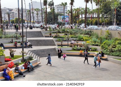 CASABLANCA, MOROCCO - FEBRUARY 22, 2022: People visit United Nations Square (Place des Nations Unies) in downtown Casablanca, Morocco. Casablanca is the largest city of Morocco.