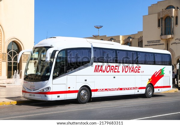 Casablanca, Morocco - September 29,\
2019: White touristic coach bus Irizar i6 in the city\
street.