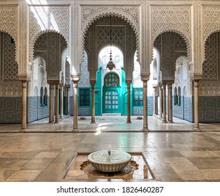 CasablancaMorocco, July 13, 2019; The interior of the Bacha courthouse in Casablanca with the traditional gate shape and a blue door in the background and nice Moroccan architecture design
