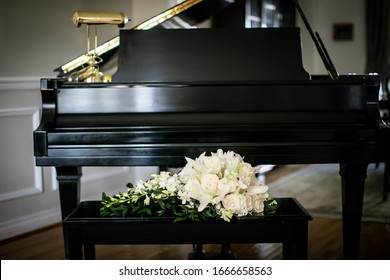 Cascade Bouquet On Black Baby Grand Piano