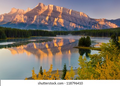 Cascade Mountain reflecting over Two Jack Lake in Banff National Park