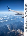 Cascade Mountains, Washington State, United States, Aerial View Airplane Snow-capped peak and clear blue sky showcasing the stunning landscape 