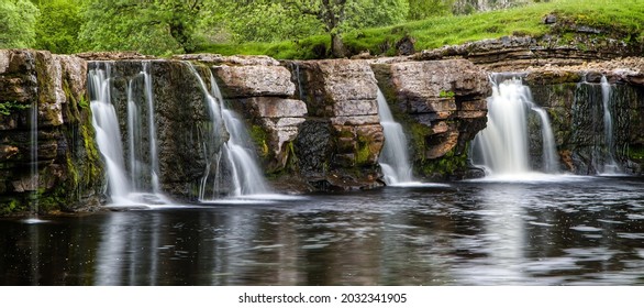 Cascade Of Waterfall On The Rocks