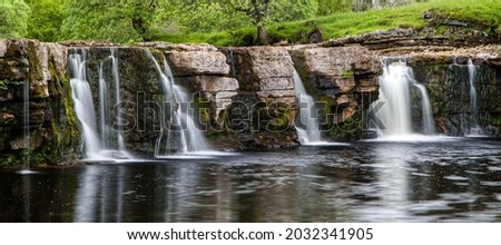 Cascade of waterfall on the rocks