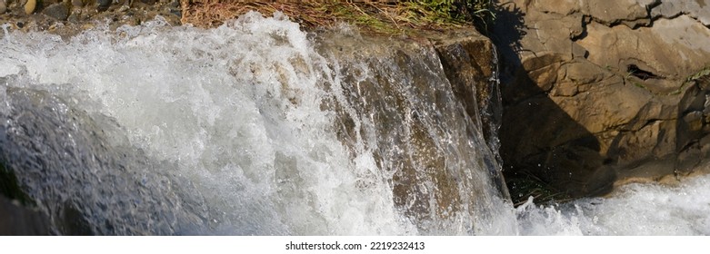 Cascade Of Waterfalls Among The Stones. Mountain River Concept