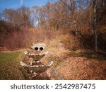 The cascading stream in the park in Bardejov spa retains water in nature.