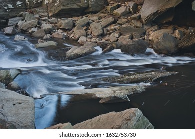 Cascading White Water, Gently Flowing Down The Rocky Rottenwood Creek