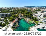 Cascais coastal resort town in Lisbon at sunny summer day, drone point of view of townscape. Turquoise waters of the Atlantic Ocean, rocky coastline. Travel, tourism concept. Portugal