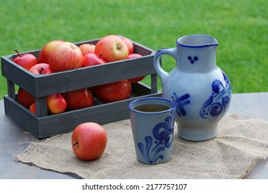 A case of apples with cider.