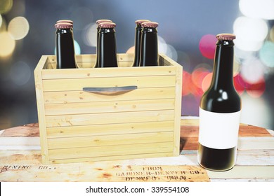 Case Of Beer And Black Bottle On Wooden Table, Mock Up