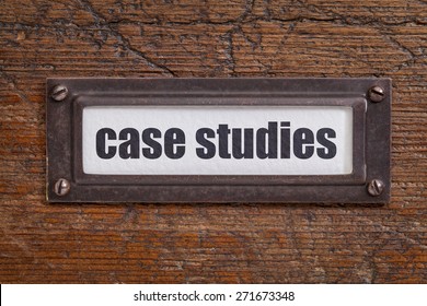 case studies  - file cabinet label, bronze holder against grunge and scratched wood