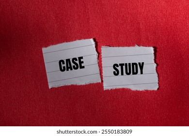 Case study message written on ripped torn paper piece with red background. Conceptual case study symbol. Copy space.