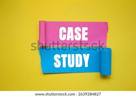 Case study message written on ripped torn color paper pieces on yellow background. Conceptual case study symbol. copy space.