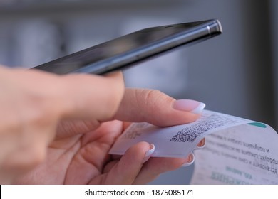 Cash Back, Sales, Online Shopping, Technology, Home Accountancy, Financial Concept. Woman Using Smartphone And Scanning Qr Code On Cash Shop Receipt Paper Or Bill From Store - Close Up Side View