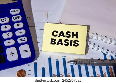 Cash Basis is shown using a text and photo of calculator.
