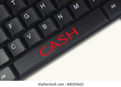 Cash button on black computer keyboard