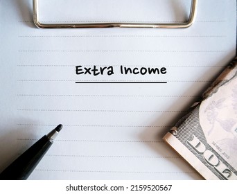 Cash Dollar Money And Pen With Text Written Paper EXTRA INCOME, Concept Of Make More Money Or Earn More Cash From Side Business, Make Extra Income From Side Hustle Gig Job