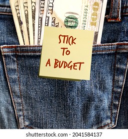 Cash Dollars Money In Jeans Pocket With Stck Note Written STICK TO BUDGET , Self Reminder To Be Frugal And Limit Spending To Meet The Financial Plan And Achieve Personal Saving Goal