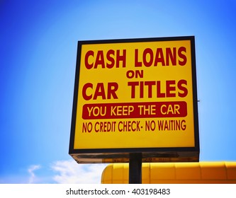 a cash loan or car title loan sign in the summer time toned with a retro vintage instagram filter app or action effect 