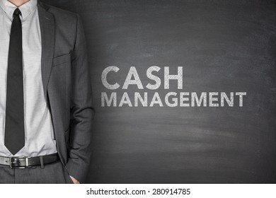 Cash Management On Black Blackboard With Businessman