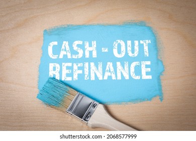Cash Out Refinance. Blue color and a brush on a wooden background. - Shutterstock ID 2068577999
