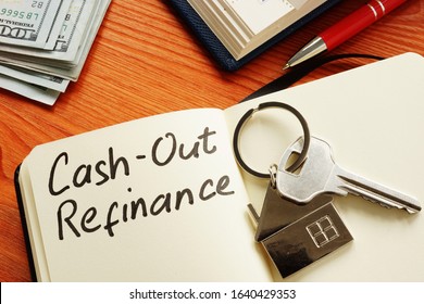 Cash out refinance and key on the notepad. - Shutterstock ID 1640429353