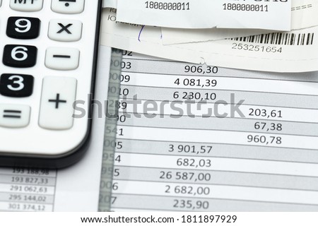 cash registers purchase receipt, calculator and financial reports, analysis and accounting, various office items for bookkeeping
