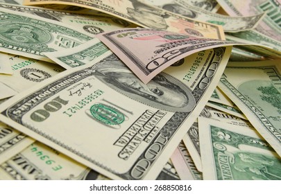 A lot of cash US dollars. - Shutterstock ID 268850816