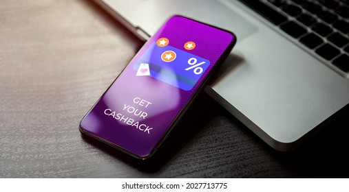 Cashback customer loyalty program concept. Smartphone with discount card with rewarding marketing points on the screen and text - get your cashback. Rewards and money refund service.