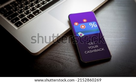 Cashback loyalty program concept. Customer rewards and money refund service. Smartphone with discount card with rewarding marketing points on the screen and text - get your cashback.