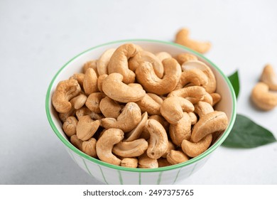 Cashew nuts in a bowl. Roasted salted cashews. Healthy snack