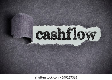 Cashflow Word Under Torn Black Sugar Paper 