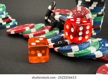 Casino chips and dice view. - Powered by Shutterstock