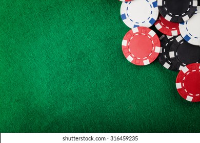 Casino Chips On The Green Table