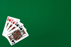 Casino Gambling Poker Blackjack Cards On Green Cloth Desk Background. Concept Of Winning Hand In Poker Game With Kings. Copy Space, Minimal Poker Game Concept.