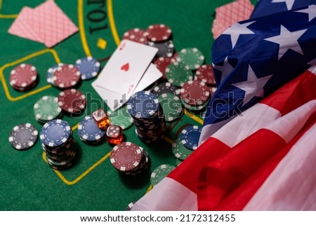 Casino. Gambling in the United States. poker chips, usa flag on blackjack table