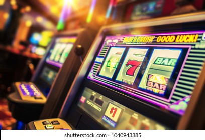 Casino Interior and Row of Classic Slot Machines. Las Vegas Gambling Theme. - Shutterstock ID 1040943385
